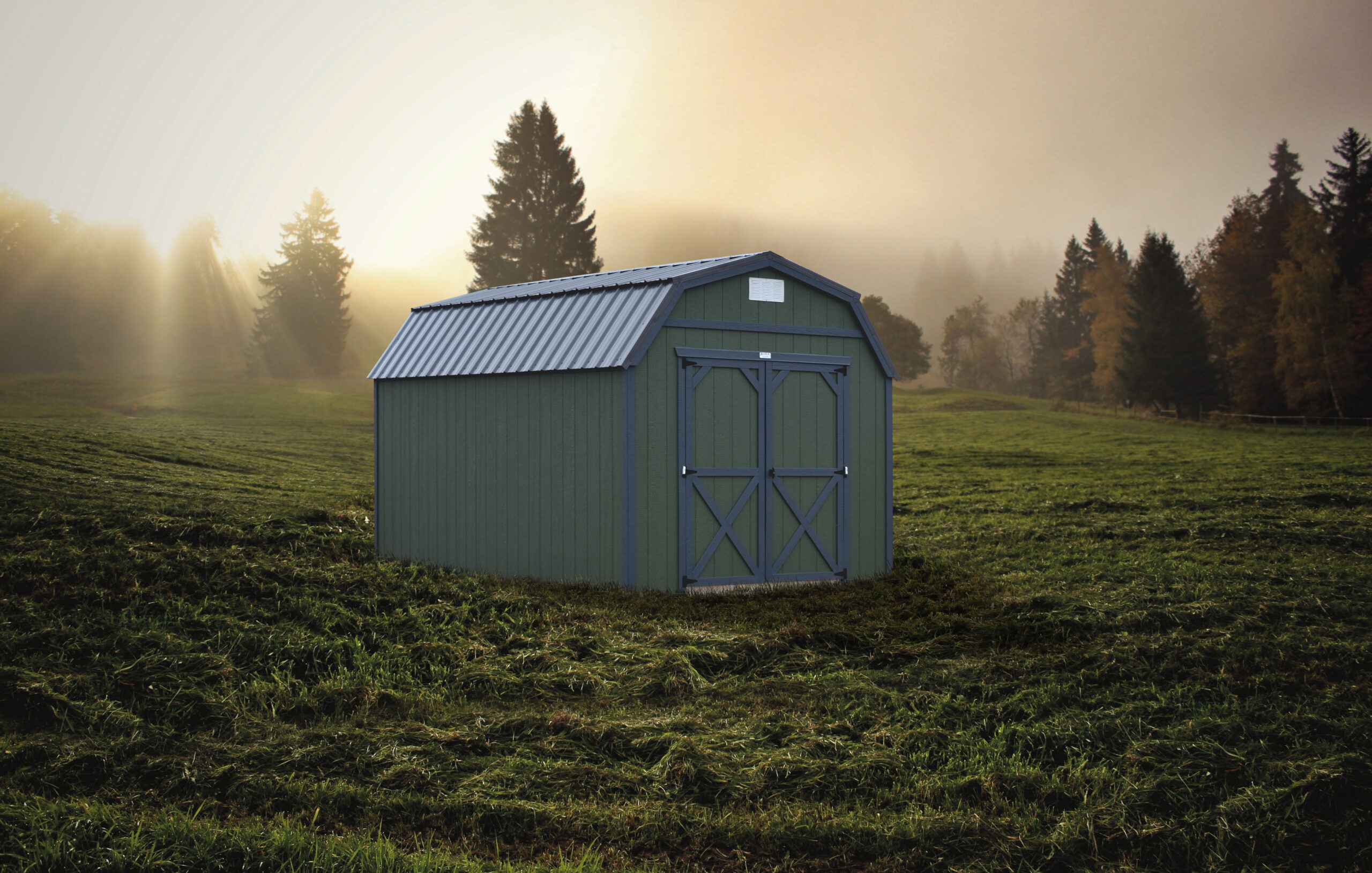 10x16 Lofted Gambrel shed with green wood siding, navy blue trim, double doors, and a navy blue metal roof.