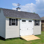 garden shed with transom windows and cupola